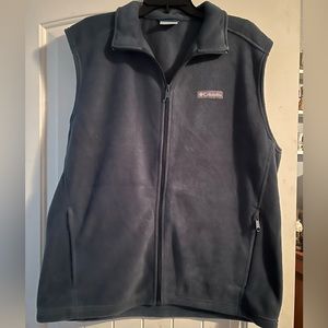 Two men’s L Columbia vests. The pictures with the sizes are the true colors.